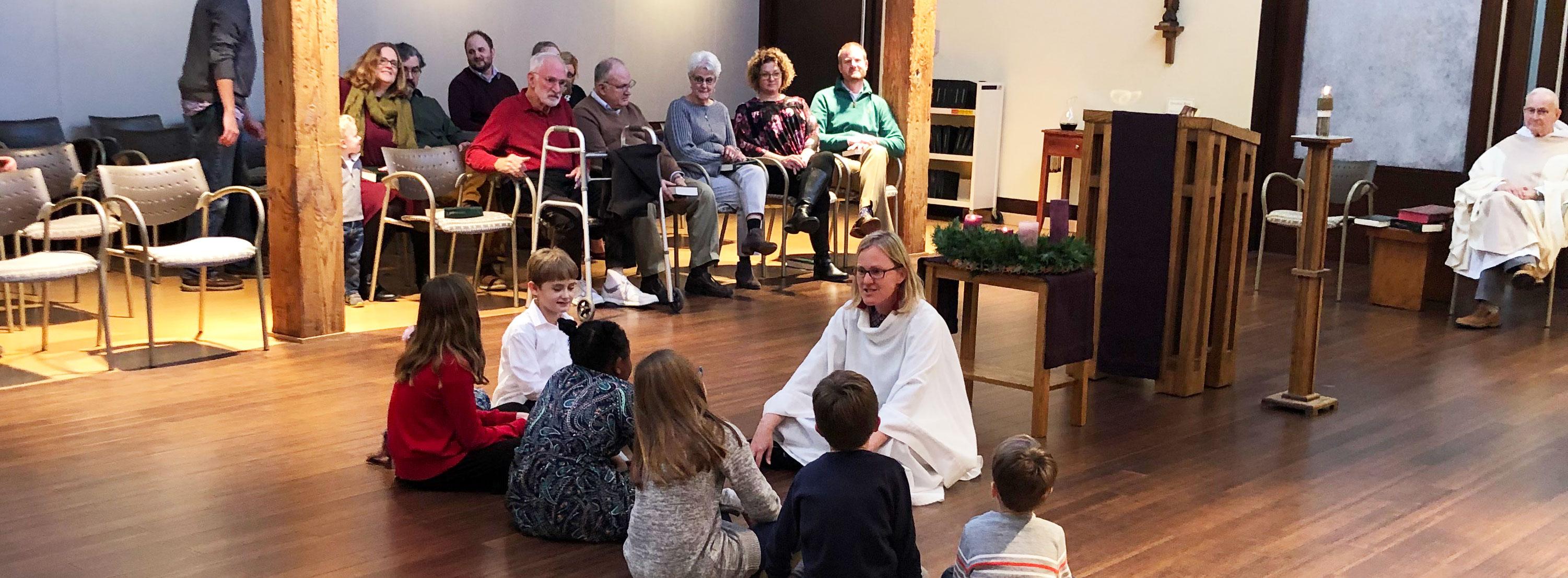 Ann preaching with children