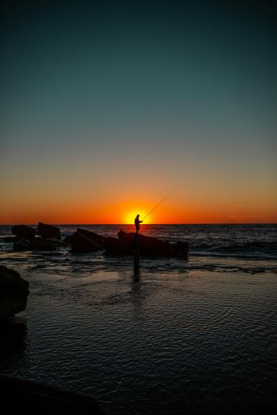 fishing at sunrise